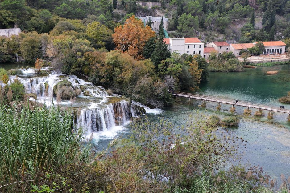 Breathtaking view of waterfalls and lush greenery at Krka National Park, Croatia.