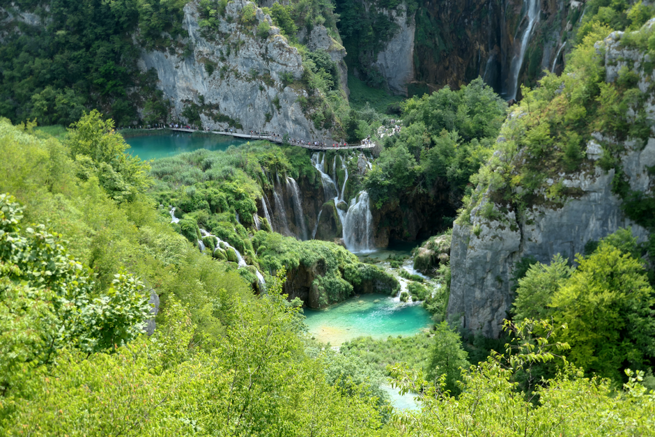 Experience the breathtaking waterfalls and lush greenery at Plitvice Lakes National Park, a UNESCO World Heritage site in Croatia.